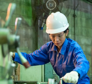 A worker wearing a hardhat.