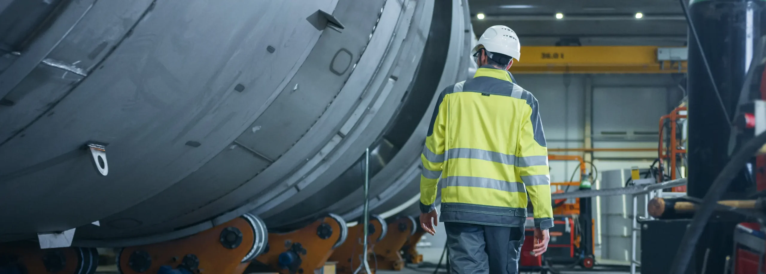 man inspecting equipment